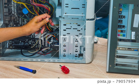 man wiring computer parts 79057934