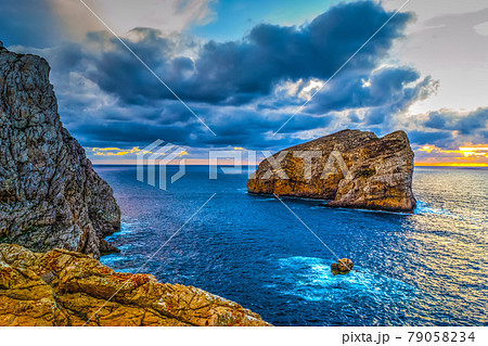 Dramatic sky over Foradada island at sunset 79058234
