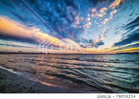 Colorful clouds over the sea at sunse 79058254