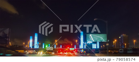 Driving through LAX pylons at night 79058574