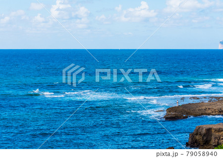 Blue sea and brown rocks in Sardinia 79058940