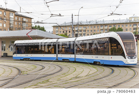 Modern tram (urban electric transport ) on a Moscow street (central district), Russia Modern tram (urban electric transport ) on a Moscow street (central district), Russia 79060463