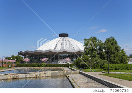 View over the Moscow State Circus on Vernadskogo Prospekt with blooming spring trees, sunny day, Russia View over the Moscow State Circus on Vernadskogo Prospekt with blooming spring trees, sunny day, Russia 79060756