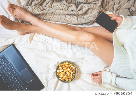 Young woman in her bed Young woman in her bed 79060854