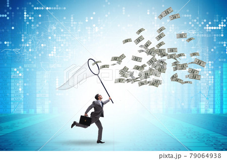 Young businessman catching dollars with landing net Young businessman catching dollars with landing net 79064938