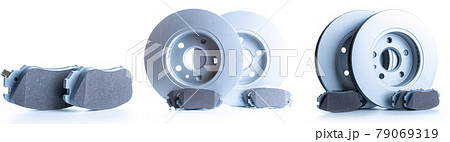 Auto mechanic. Set of new metal car part. Auto motor mechanic spare or automotive piece isolated on dark background. Automobile engine service. Auto mechanic. Set of new metal car part. Auto motor mechanic spare or automotive piece isolated on dark background. Automobile engine service. 79069319