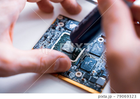 Solutions services electronic hardware. Engineer technician man upgrade and maintenance digital pc. Technology chip equipment repair. 79069323