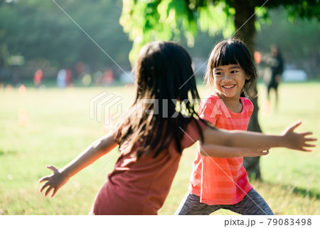 Asian girl is jogging in the park in the morning Asian girl is jogging in the park in the morning 79083498