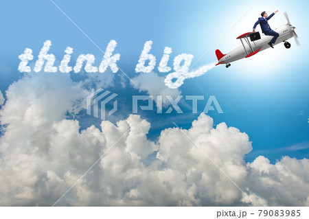 Think big concept with businessman Think big concept with businessman 79083985