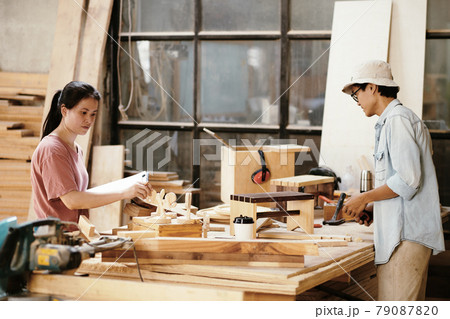 Carpenters Creating Woodwork Projects 79087820