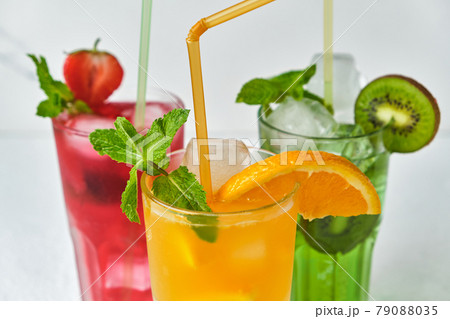 mix of three bright colored delicious cold lemonade 79088035