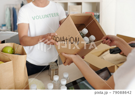 Person Donating Bottled Water Person Donating Bottled Water 79088642