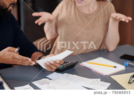 Couple Discussing Big Purchase Couple Discussing Big Purchase 79088955