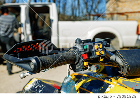 Handlebar of four-wheeled ATV quad bike close up Handlebar of four-wheeled ATV quad bike close up 79091828