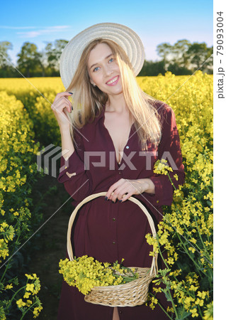 woman in a blooming field woman in a blooming field 79093004