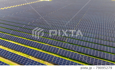 Aerial drone view flight over solar power station panels. 79095279