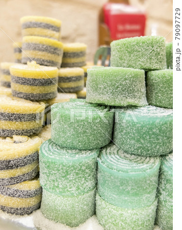 A Stack of colored sugar jelly beans. A Stack of colored sugar jelly beans. 79097729