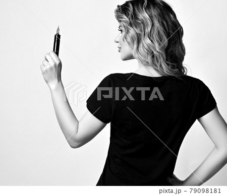 Black and white. Curly woman in black t-shirt Black and white. Curly woman in black t-shirt 79098181