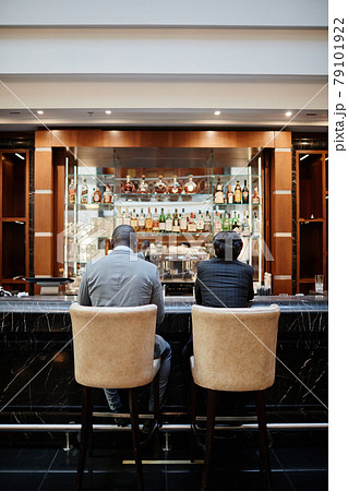 Business People at Bar Back View 79101922