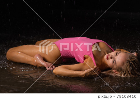 Wet woman face with water drop. Moisturizing. Wet woman face with water drop. Moisturizing. 79103410