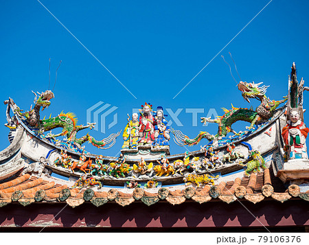 Asia culture concept - Roof with beautiful decoration of famous heritage landmark, the traditional old oriental Chinese temple in Taiwan. Asia culture concept - Roof with beautiful decoration of famous heritage landmark, the traditional old oriental Chinese temple in Taiwan. 79106376