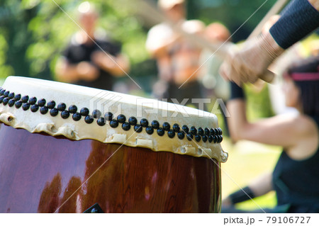 Close-up of a large Taiko drum for traditional Japanese drummers Close-up of a large Taiko drum for traditional Japanese drummers 79106727