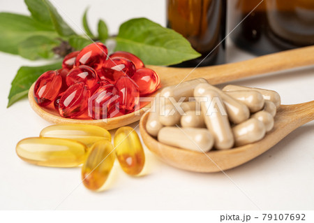 Alternative medicine herbal organic capsule with vitamin E omega 3 fish oil, mineral, drug with herbs leaf natural supplements for healthy good life.. 79107692