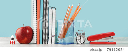 Assorted office and school orange and blue stationery with red apple 79112024