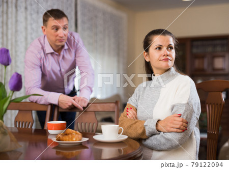 Annoyed husband and wife quarreling Annoyed husband and wife quarreling 79122094
