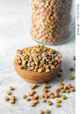 Dry kibble animal food. Dried food for cats or dogs. 79127550