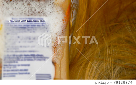 Sodium laureth sulfate (SLES). Composition of shampoo with sulfate on woman's hair 79129374