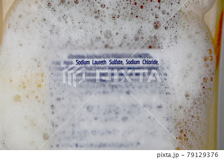 Sodium laureth sulfate (SLES). Composition of shampoo with sulfate on woman's hair Sodium laureth sulfate (SLES). Composition of shampoo with sulfate on woman's hair 79129376