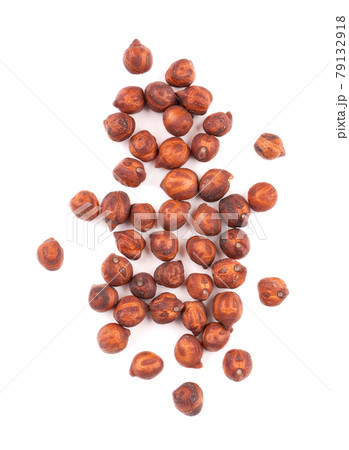 Pile of brown chickpeas, isolated on white background. Brown chickpea. Garbanzo, bengal gram or chick pea bean. Top view. 79132918