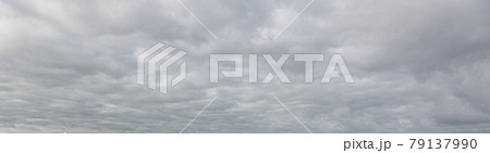 Image of a dark and cloudy sky during the day Image of a dark and cloudy sky during the day 79137990