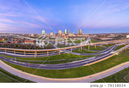 Aerial panorama picture of the Fort Worth skyline at sunrise with highway intersection in Texas 79138034