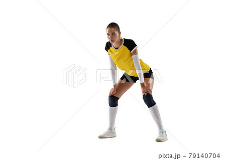 Female professional volleyball player with ball isolated on white studio background. The athlete, exercise, action, sport, healthy lifestyle, training, fitness concept. Female professional volleyball player with ball isolated on white studio background. The athlete, exercise, action, sport, healthy lifestyle, training, fitness concept. 79140704