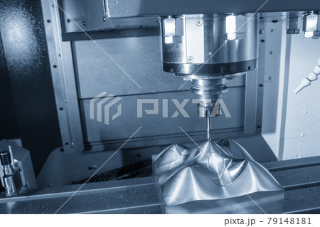 The  CNC  milling machine cutting  the mold parts. The  CNC  milling machine cutting  the mold parts. 79148181