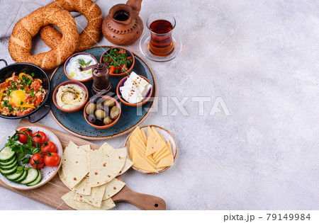 Traditional Turkish breakfast with meze and simit 79149984