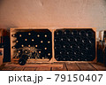 Wine cellar with wine bottles in wooden crates 79150407