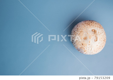 Tropical fruit coconut whole , on blue textured summer background, top view flat lay, with copy space for text 79153209