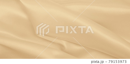 Smooth elegant golden silk or satin luxury cloth texture as wedding background. Luxurious background design. In Sepia toned. Retro style Smooth elegant golden silk or satin luxury cloth texture as wedding background. Luxurious background design. In Sepia toned. Retro style 79153973