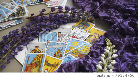 romantic Tarot Setup Background. Tarot cards and Lupin flowers. romantic Tarot Setup Background. Tarot cards and Lupin flowers. 79154756