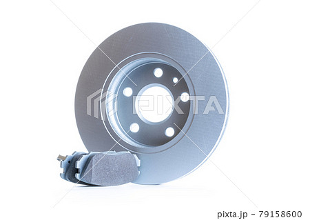 Car parts. New metal car part. Auto motor mechanic spare or automotive piece isolated on white background. Technology of mechanical gear with space for text. Car parts. New metal car part. Auto motor mechanic spare or automotive piece isolated on white background. Technology of mechanical gear with space for text. 79158600