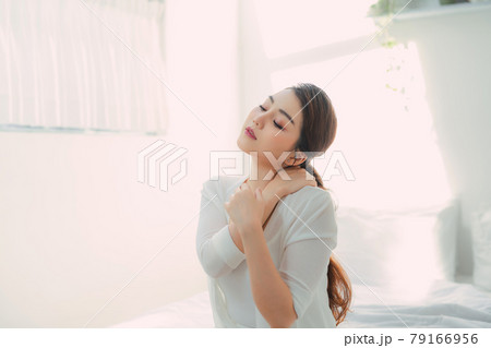 Beautiful asian woman in bedroom morning portrait Beautiful asian woman in bedroom morning portrait 79166956