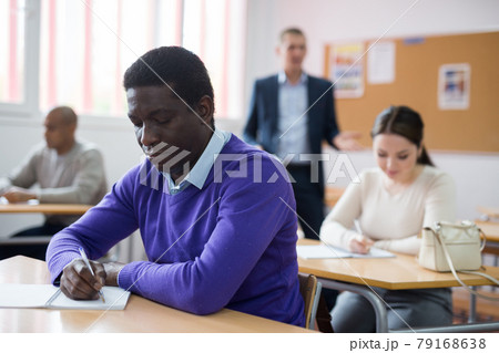 African-american student among students in classroom African-american student among students in classroom 79168638
