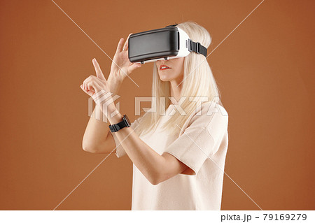 Modern Woman Using Wireless Device Modern Woman Using Wireless Device 79169279