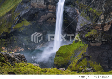 Haifoss waterfall in Iceland - one of the highest waterfall in Iceland, popular tourist destination. Haifoss waterfall in Iceland - one of the highest waterfall in Iceland, popular tourist destination. 79173082