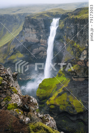 Haifoss waterfall in Iceland - one of the highest waterfall in Iceland, popular tourist destination. 79173083