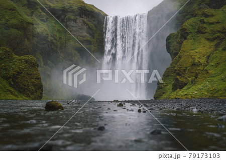 Famous and most visited Skogafoss waterfall in Iceland at evening light Famous and most visited Skogafoss waterfall in Iceland at evening light 79173103