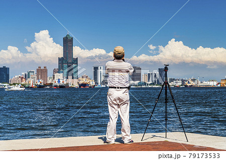 Tourists visiting the scenery and take photos in the port of Kaohsiung, Taiwan. 79173533